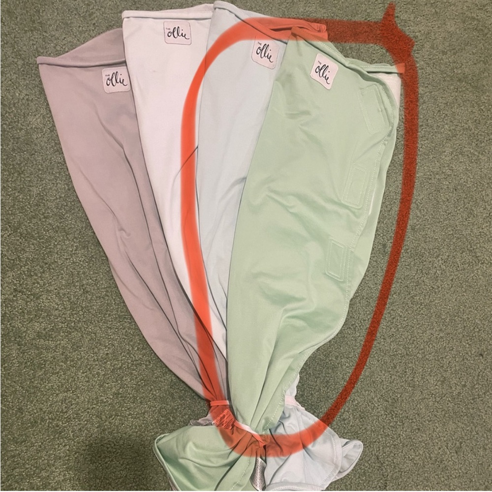 Green and blue Ollie swaddles